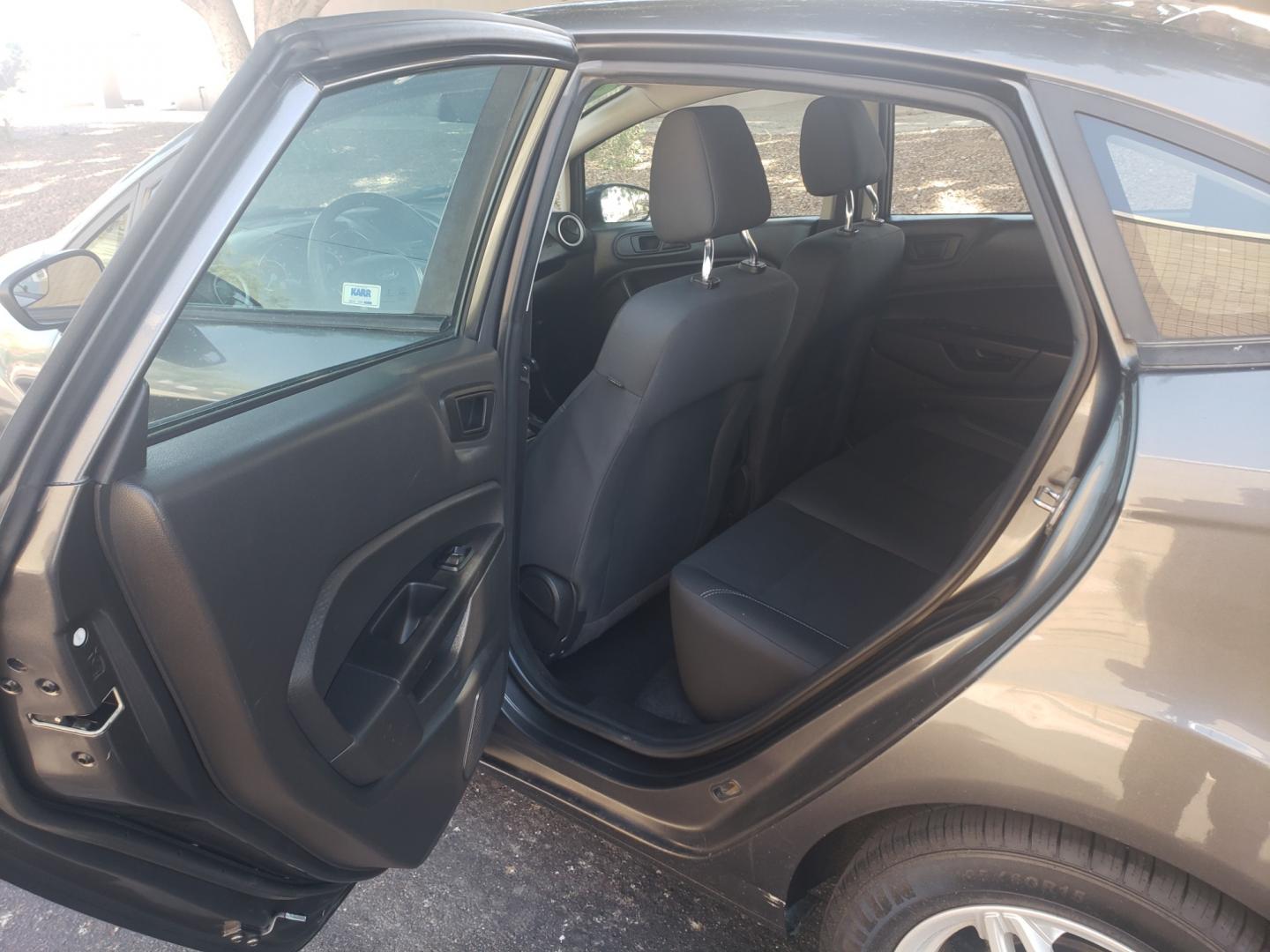 2019 /black Ford Fiesta SE (3FADP4BJ3KM) with an 1.6L L4 DOHC 16V engine, 6-Speed Automatic transmission, located at 323 E Dunlap Ave., Phoenix, AZ, 85020, (602) 331-9000, 33.567677, -112.069000 - Photo#10